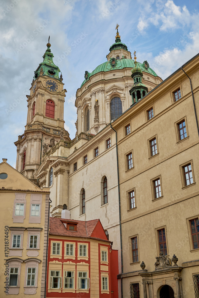 Fototapeta premium Church of Saint Nicholas, Baroque Roman Catholic Church in Mala Strana district in Prague, Czech Republic