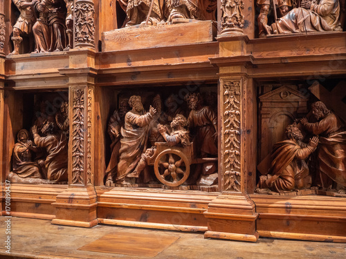 Fototapeta Lower panels of wooden altarpiece with biblical scenes in Albarracín Cathedral