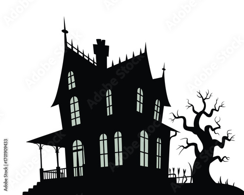 Silhouette of a spooky victorian haunted house with a bare tree