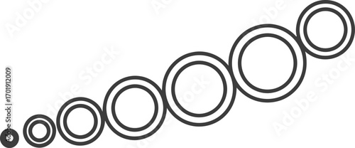 A sequence of black and white concentric circles increasing in size along a diagonal path.