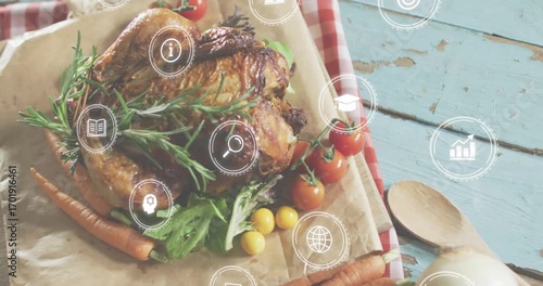 White icons materializing above roasted chicken, drifting clockwise, pulsing to visualize overlay