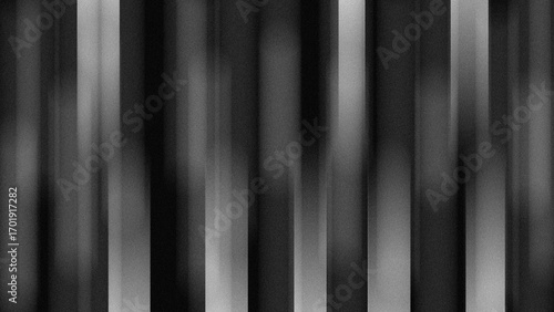 Vertical striped black and white background with blurry texture. , striped opaque surface