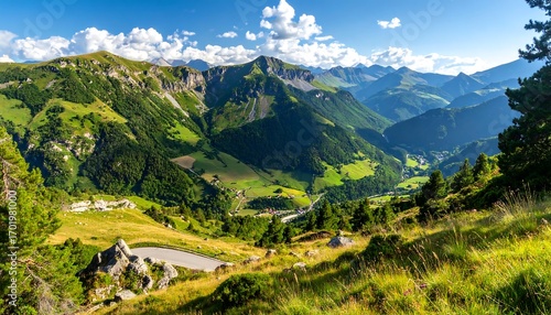 A picturesque alpine valley unfolds beneath towering mountain peaks, bathed in sunlight. Lush greenery blankets the slopes, revealing a serene and vibrant landscape.