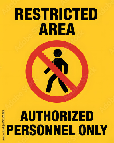 Restricted area sign indicating no entry for unauthorized personnel with a yellow background color