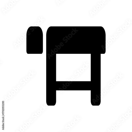 Illustration of a simple black table with rounded edges and a separate rounded element on the left side