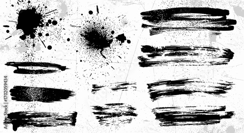 Collection of black ink blots and brush strokes on a light background.