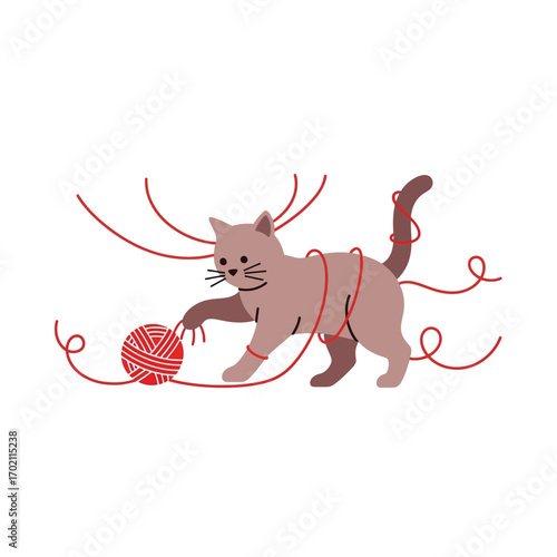 Playful Kitten Entangled in a Ball of Red Yarn