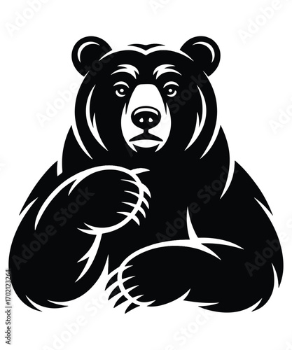 Majestic bear sits upright, powerful paws ready, eyes calmly watching