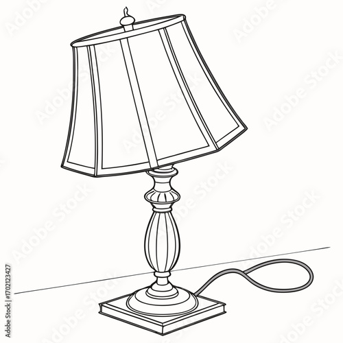 Table lamp with a cord and a lampshade on a flat surface