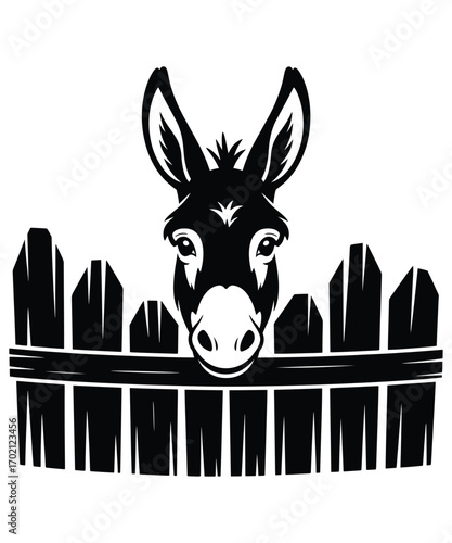 Donkey peeks over wooden fence silhouette