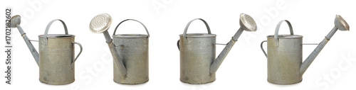 Set of vintage watering cans isolated on white background