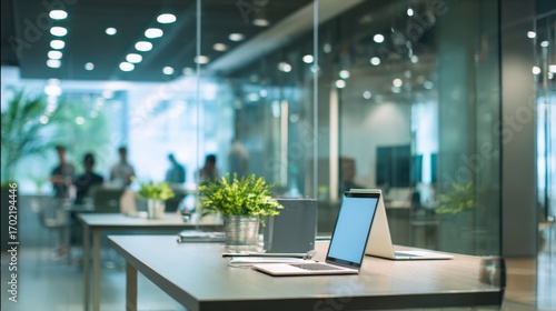 Wallpaper Mural Modern Open-Concept Office Space with Glass Enclosures and Collaborative Work Environment, Featuring Laptop and Desk Plants Torontodigital.ca