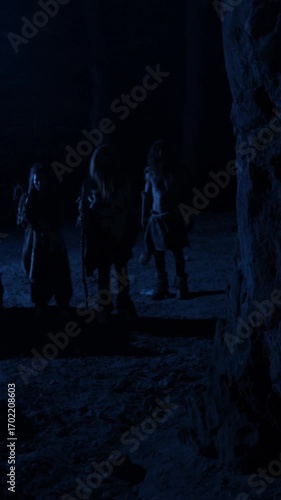 Wallpaper Mural The Mysterious Figures in the Dark Cavern are a captivating and eerie sight to behold Torontodigital.ca