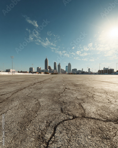 Vibrant Urban Day Scene Featuring Wide Empty Lot and Detailed Indianapolis Cityscape, Bright Sunlight 
