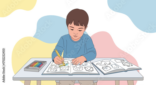 A young boy enjoys coloring in his drawing book with colorful crayons at his desk
