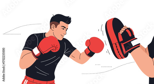 Boxer practicing punches with a pad training in a studio environment for a match