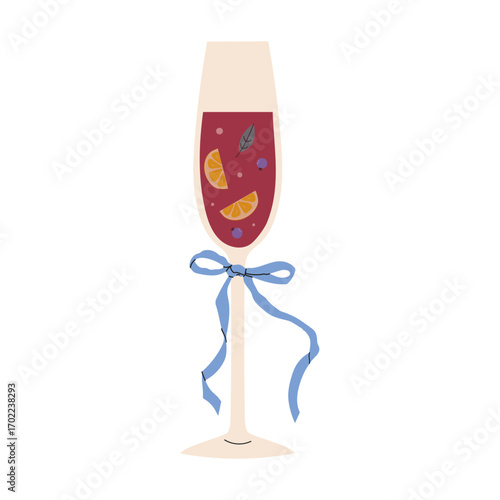 Festive cocktail in a tall glass with fruit and a ribbon, perfect for celebrations and gatherings