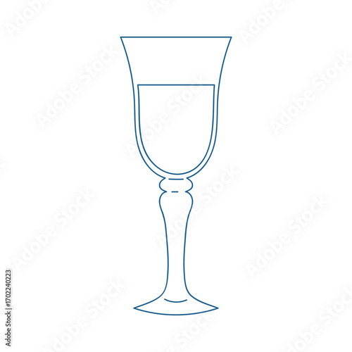 Elegant glass filled with clear water standing on a minimalistic background in soft light during a calm afternoon