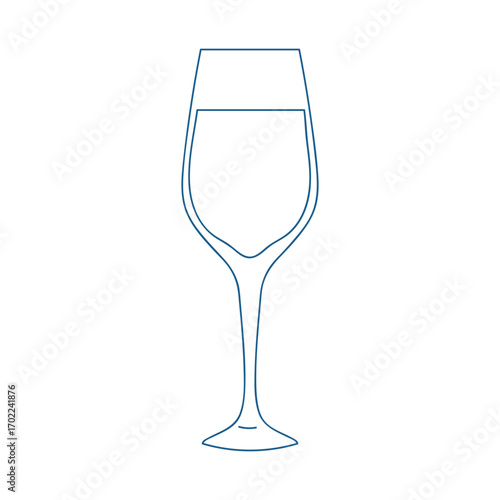 Elegant glass filled with water on a serene table setting at a sunny outdoor patio during a relaxing afternoon