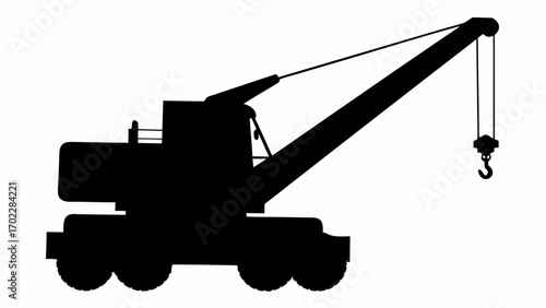 Silhouette of a heavy crane with boom and hook, machinery for lifting and construction equipment shown