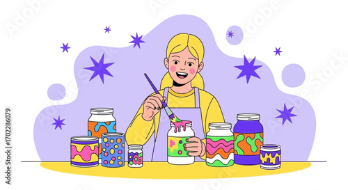 Happy young woman painting various jars with colorful paints in a studio