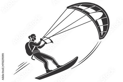 Silhouette of a person kitesurfing on a board with a kite