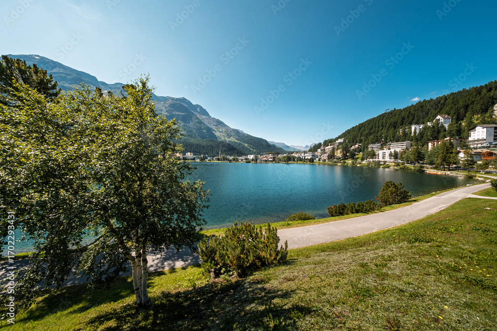 Fototapeta premium St. Moritz Lake and picturesque town leading in to the Engadin valley