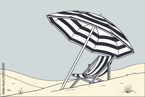 Striped beach umbrella and deck chair on sandy dunes