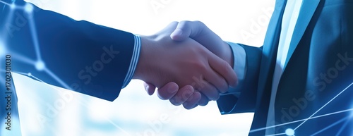Business Partnership Handshake with Digital Network Background