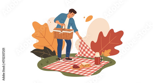 Man Preparing for a Picnic in a Park Setting with Food and Picnic Basket