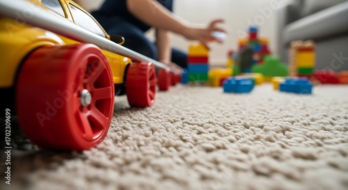 Wallpaper Mural Child Playing with Toy Car and Building Blocks on Carpet in Living Room Torontodigital.ca