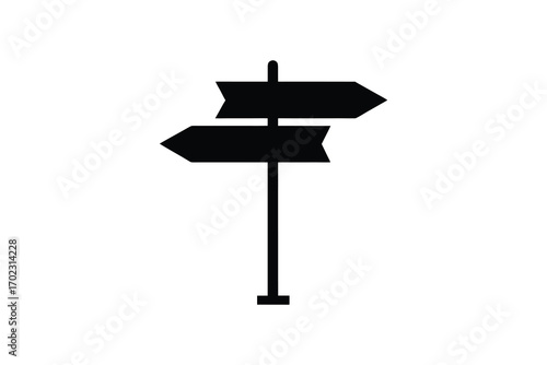 directional signs pointing different ways silhouette