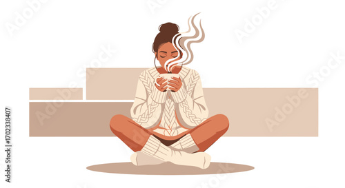Woman enjoying a warm drink and relaxing while sitting in the lotus position