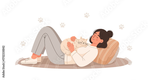Woman Enjoys Relaxing Moment Holding Her Adorable Cat and Feeling Contented Comfort