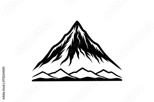 a majestic mountain peak with layered ridges and shadowy silhouette