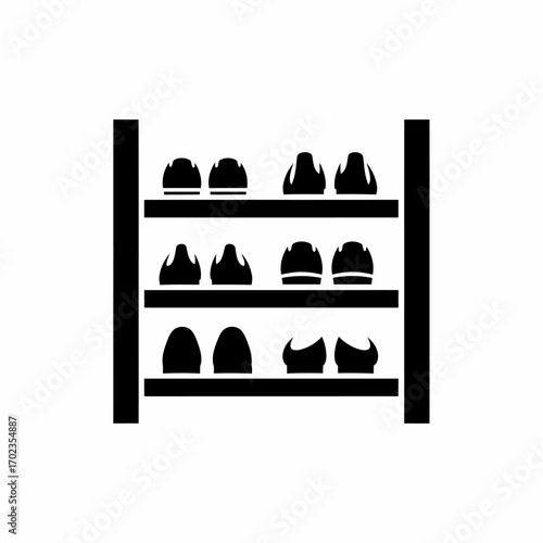 A simple black icon depicting a shoe rack filled with various pairs of shoes.