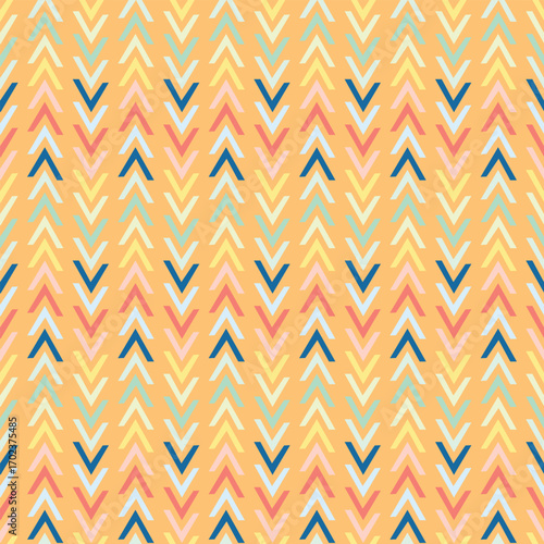 A repeating pattern composed of chevron shapes or arrows pointing in various directions horizontally in various colors on an orange background for wallpaper, textiles, curtains,tablecloths,picnic mats