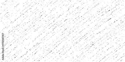 Abstract black and white water droplets on a transparent glass surface with a textured pattern