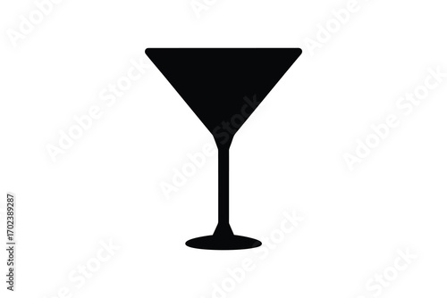 a black martini glass stands out against white background silhouette