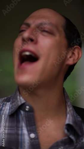handsome singer plays the acoustic guitar