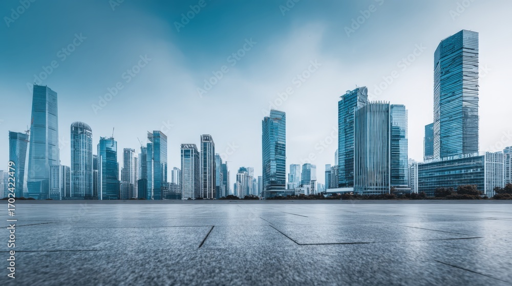Obraz premium Modern Cityscape Skyline with Contemporary Architecture and Urban Infrastructure Against a Clear Blue Sky