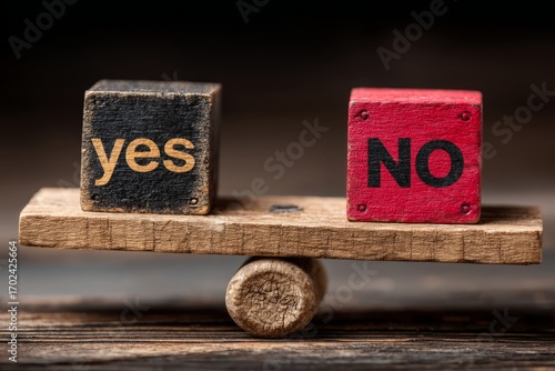 Two wooden blocks with the word yes on one and no on the other
