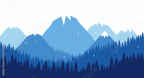 Winter mountain landscape with snow-capped peaks and a dense forest.