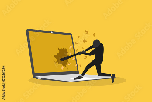 Crazy stressed businessman destroying his desk and laptop with a baseball bat, concept of job burnout, and pressure