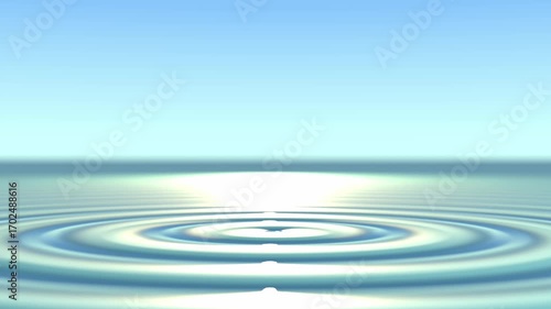 Drop Creating Expanding Ripples on a Calm Water Surface