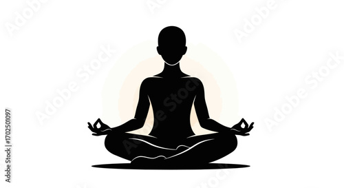 Silhouetted Person in Meditative Yoga Pose.