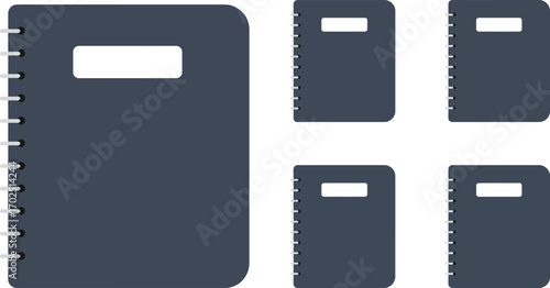 notebooks arranged in various sizes and orientations
