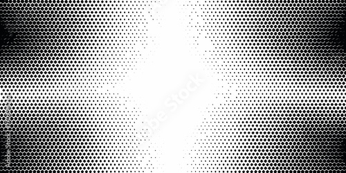 Abstract black and white halftone pattern with fading dots creating a gradient effect