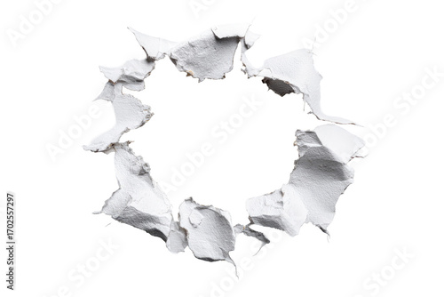 Circular hole punched through white paper