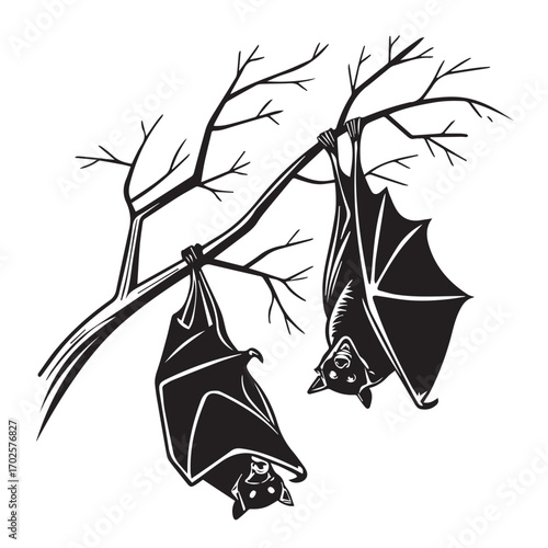 Two black bats hanging upside down from a bare tree branch, isolated on white background